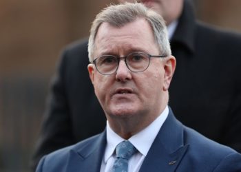 Leader of Northern Ireland’s main pro-union party resigns after police charges