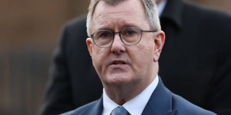 Leader of Northern Ireland’s main pro-union party resigns after police charges