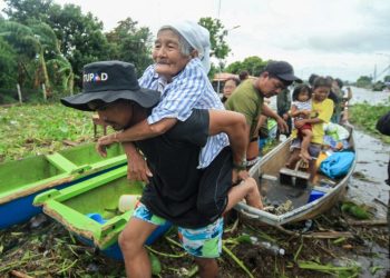 Tropical Storm Trami brings severe flooding and landslides to the Philippines, at least two dozen dead