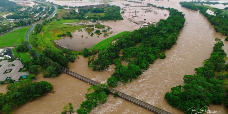 One dead, thousands evacuated as northeast Australia battles massive floods