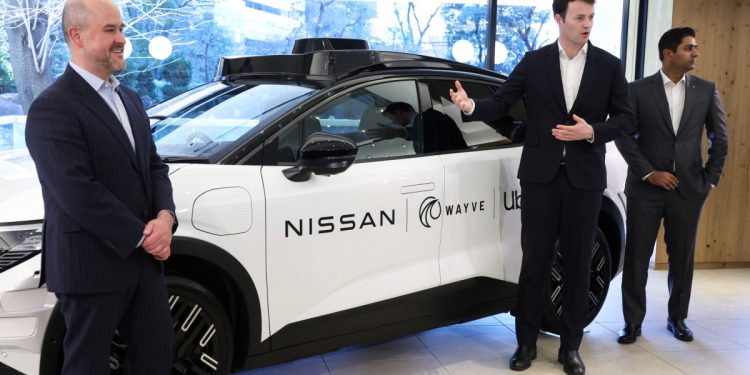 Rivian, Uber stocks struggle, but robotaxi deal may change the story