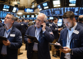 Dow gains 160 points as chip selloff drags Nasdaq ahead of earnings season